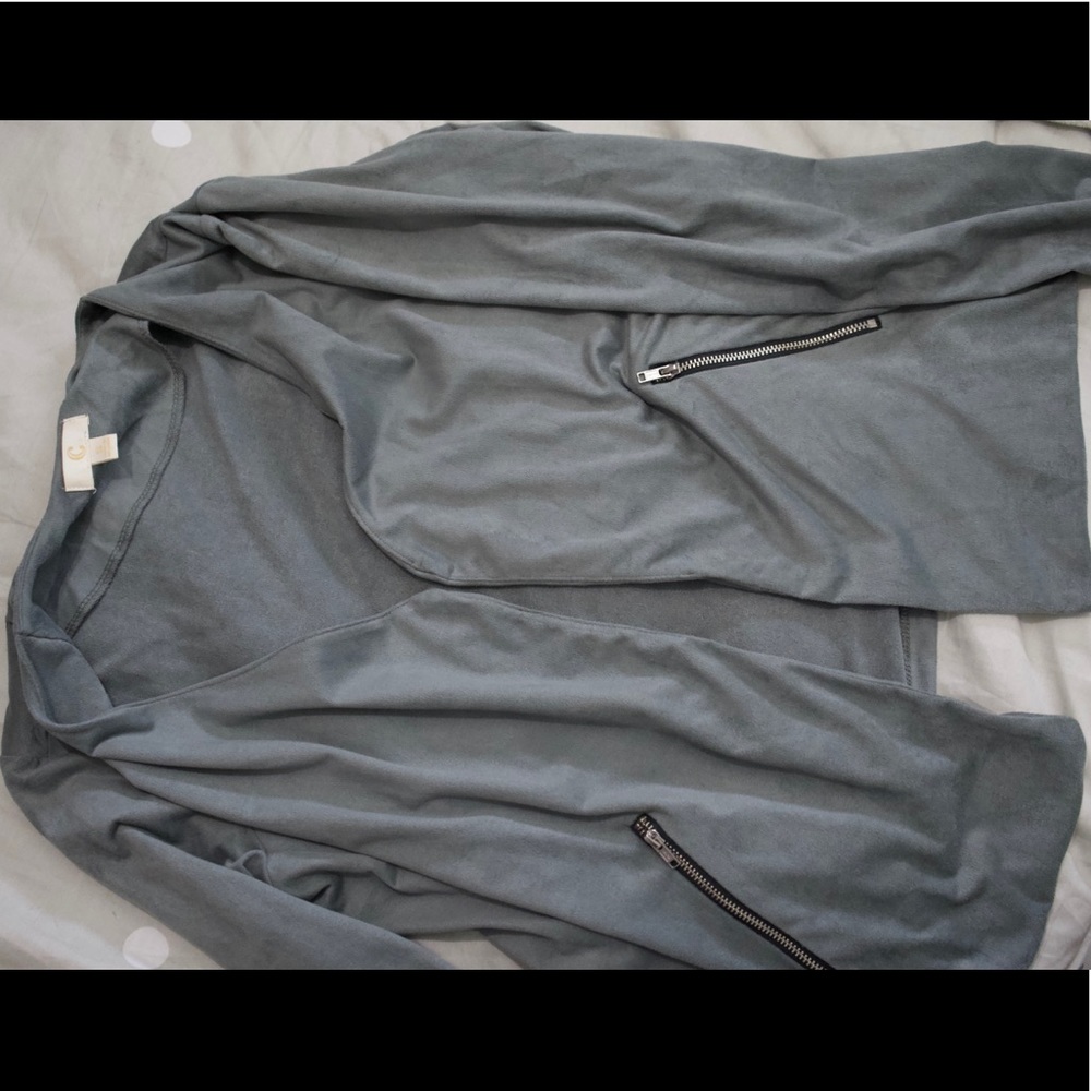 gray cardigan.